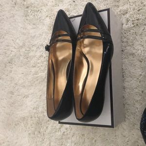 coach black pumps